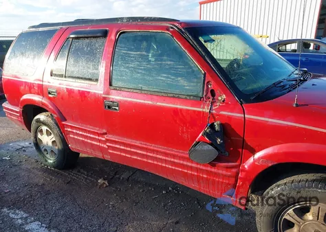 1997 Oldsmobile Bravada из США, поврежденный, VIN 1GHDT13W0V2719866